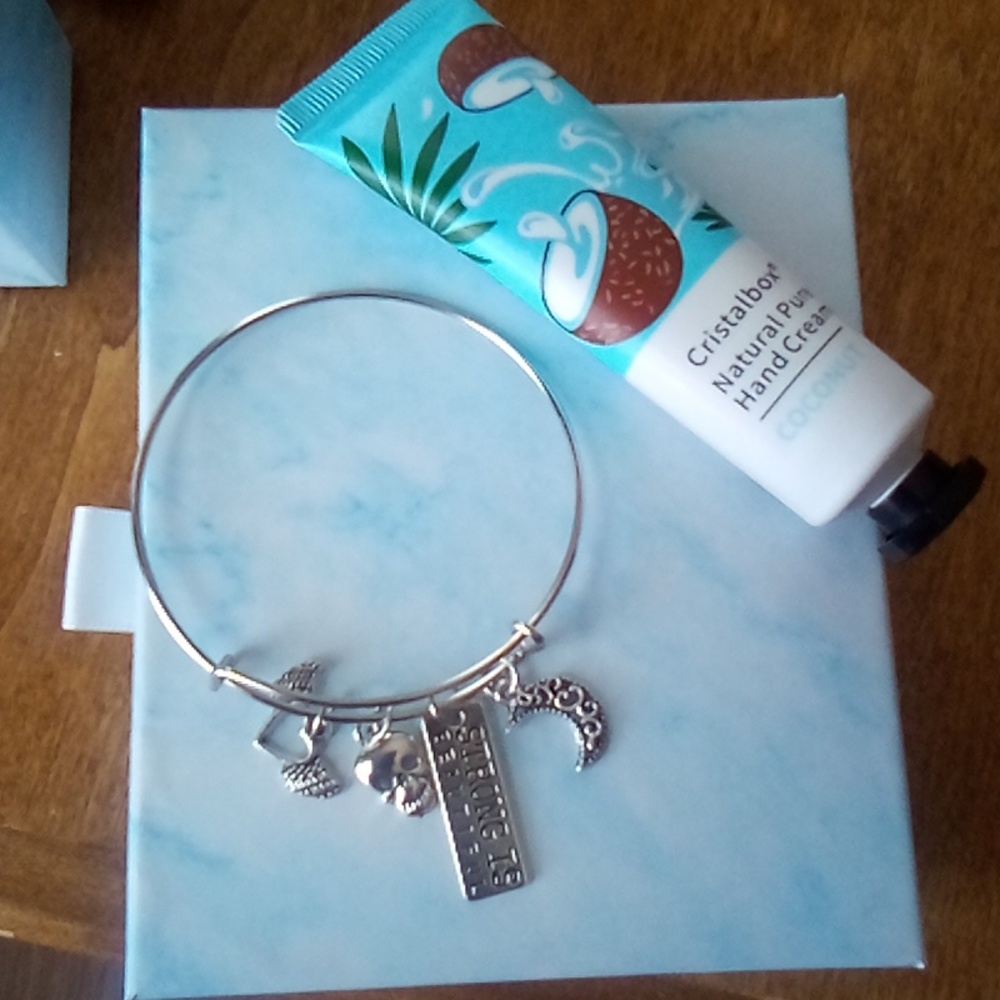 NWT!strong is beautiful braclet with a lotion